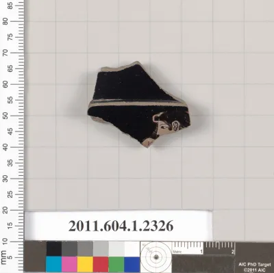 Terracotta fragment of a kylix (drinking cup)