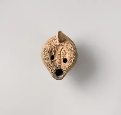 Terracotta oil lamp
