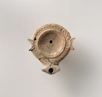 Terracotta oil lamp