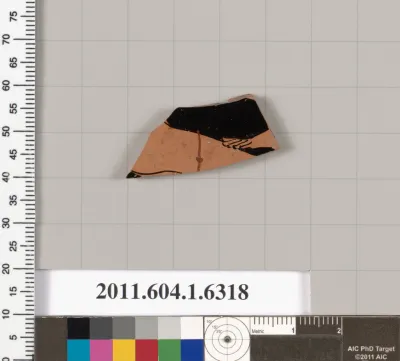 Terracotta fragment of a kylix (drinking cup)