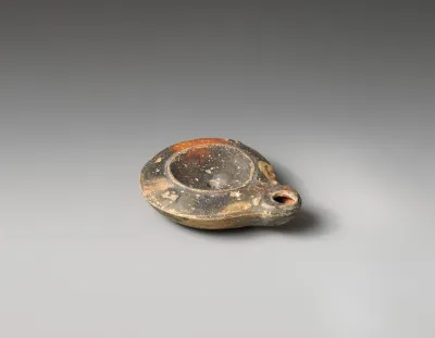 Terracotta oil lamp