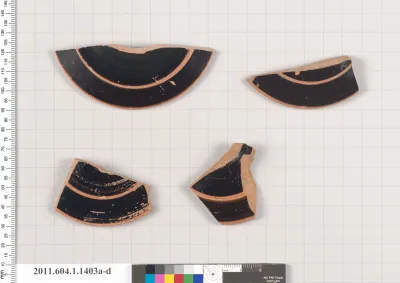 Terracotta fragments of kylikes (drinking cups)