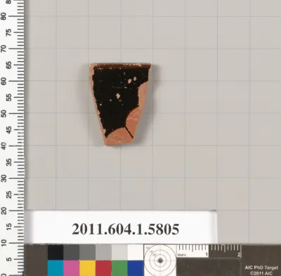 Terracotta fragment of a kylix: eye-cup  (drinking cup)