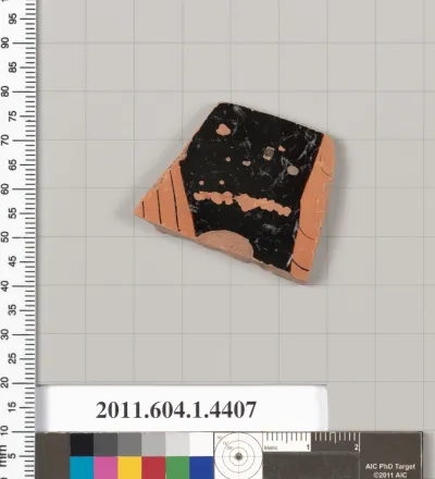 Terracotta fragment of a kylix (drinking cup)