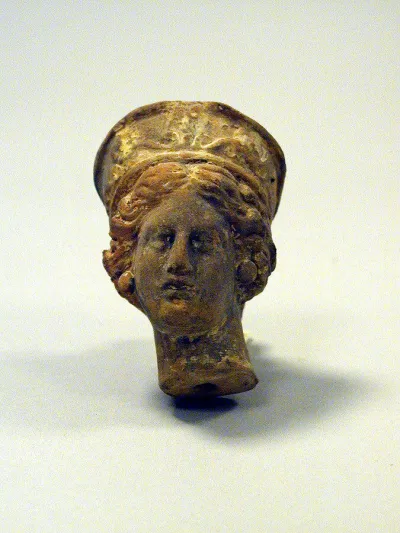 Head of a woman from a statuette