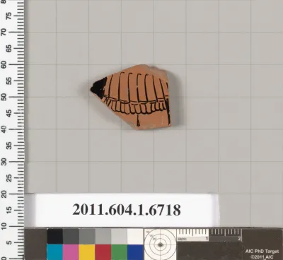 Terracotta fragment of a kylix (drinking cup)