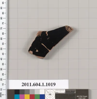 Terracotta fragment of a kylix (drinking cup)