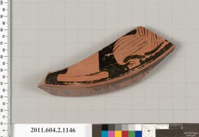 Terracotta fragment of a lekanis lid (covered dish)
