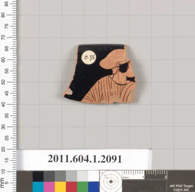 Terracotta rim fragment of a kylix (drinking cup)