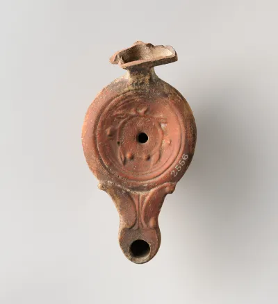 Terracotta oil lamp