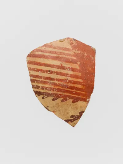 Terracotta vessel fragment with linear motifs