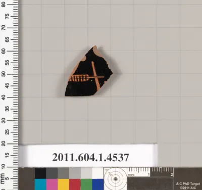 Terracotta fragment of a kylix (drinking cup)