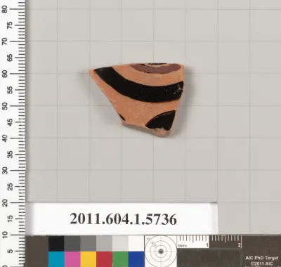 Terracotta fragment of a kylix: eye-cup  (drinking cup)