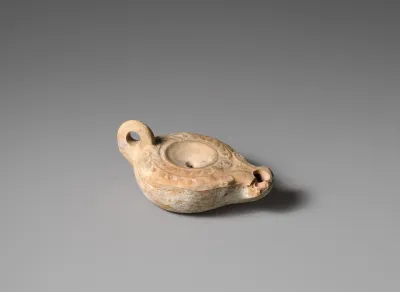 Terracotta oil lamp