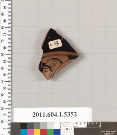 Terracotta fragment of a kylix (drinking cup)