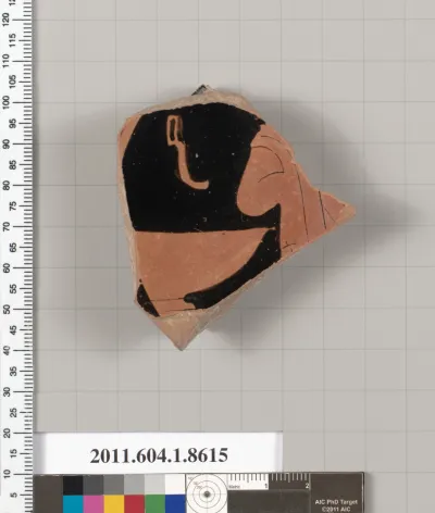 Terracotta fragment of a stemless kylix (drinking cup)