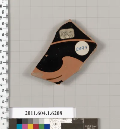 Terracotta fragment of a kylix (drinking cup)