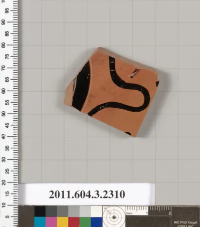 Terracotta fragment of a kylix: eye-cup (drinking cup)