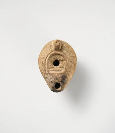 Terracotta oil lamp