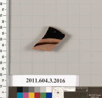 Terracotta fragment of a kylix (drinking cup)