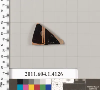 Terracotta fragment of a kylix (drinking cup)