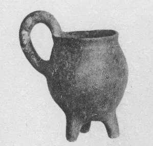 TRIPOD VASE (CYPRIOT, BRONZE AGE, RED POLISHED WARE)