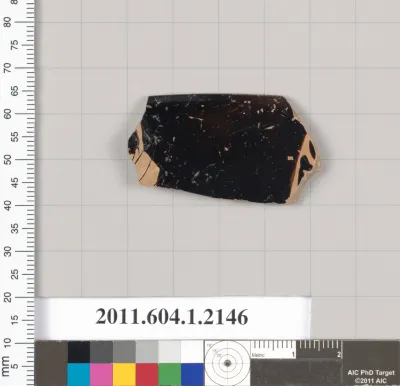 Terracotta rim fragment of a kylix (drinking cup)