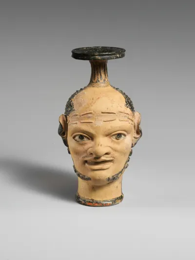 Terracotta vase with janiform heads