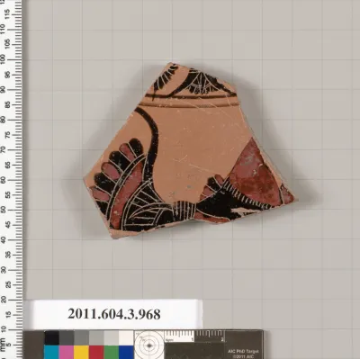 Terracotta fragment of a lekanis lid (covered dish)