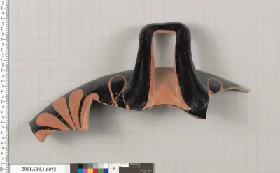 Terracotta fragment of a kylix (drinking cup)