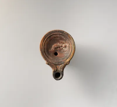 Terracotta oil lamp