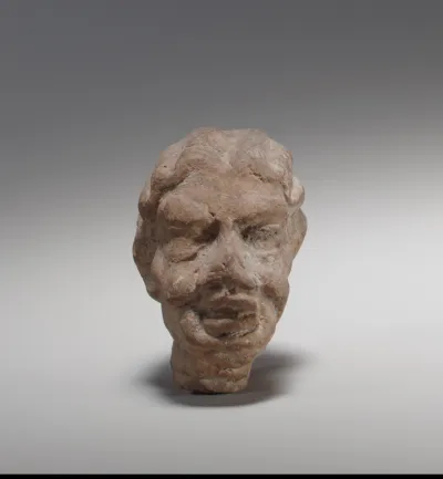 Terracotta head of an old woman