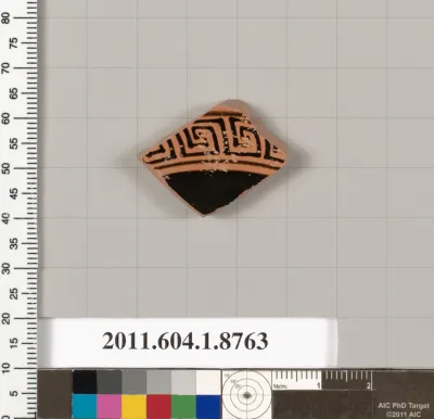 Terracotta fragment of a kylix (drinking cup)