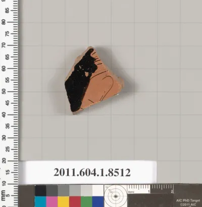 Terracotta fragment of a stemless kylix (drinking cup)