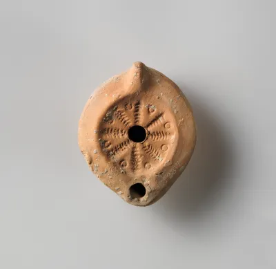 Terracotta oil lamp