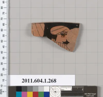 Terracotta rim fragment of a kylix (drinking cup)