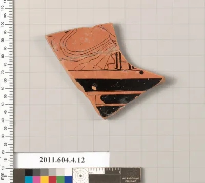 Terracotta fragment of a kylix (drinking cup)