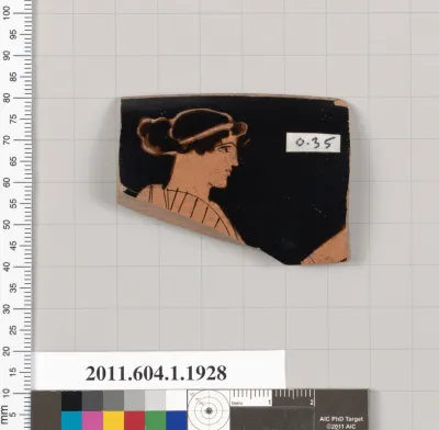 Terracotta rim fragment of a kylix (drinking cup)