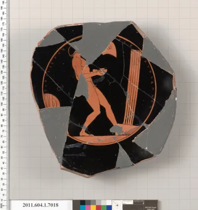 Terracotta fragment of a kylix (drinking cup)