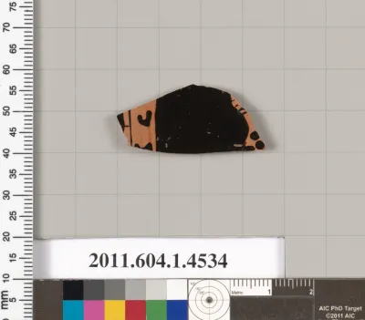 Terracotta fragment of a kylix (drinking cup)