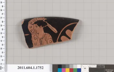 Terracotta rim fragment of a kylix (drinking cup)
