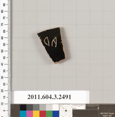 Terracotta fragment of a kylix (drinking cup)