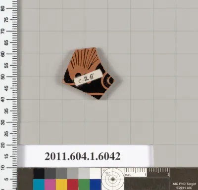 Terracotta fragment of a kylix (drinking cup)