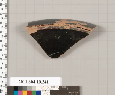 Terracotta fragment of a "fish plate"?