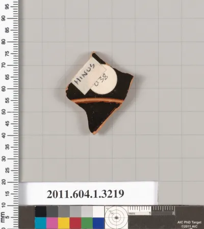 Terracotta fragment of a kylix (drinking cup)