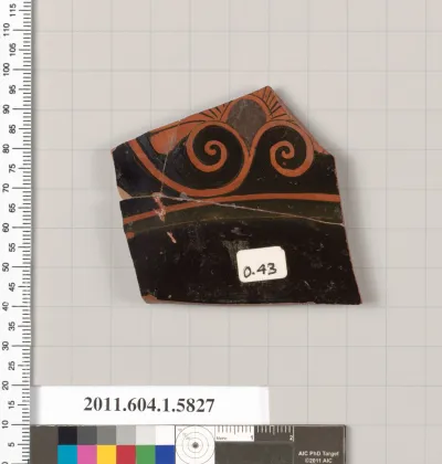 Terracotta fragment of a kylix: eye-cup  (drinking cup)