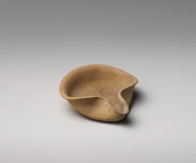 Terracotta saucer-shaped lamp