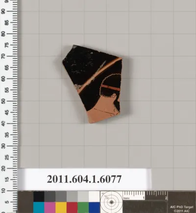 Terracotta fragment of a kylix (drinking cup)