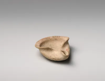 Terracotta saucer-shaped lamp