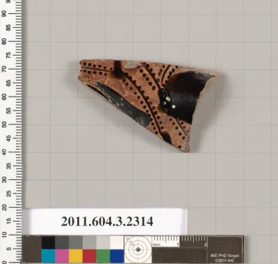 Terracotta fragment of a kylix: eye-cup (drinking cup)